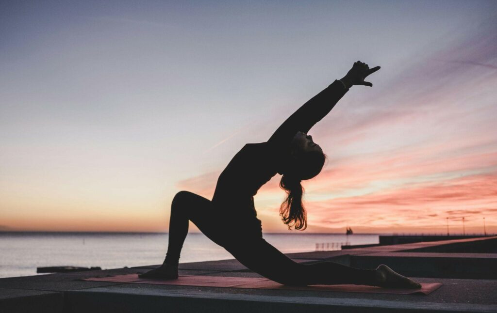 girl doing yoga - the art of thriving